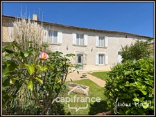 Stone house for sale in Champigny-En-Rochereau (86), 6 rooms, 4 bedrooms, 1900 m² plot with outbuildings