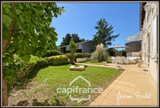 Stone house for sale in Champigny-En-Rochereau (86), 6 rooms, 4 bedrooms, 1900 m² plot with outbuildings