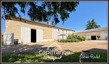 Stone house for sale in Champigny-En-Rochereau (86), 6 rooms, 4 bedrooms, 1900 m² plot with outbuildings