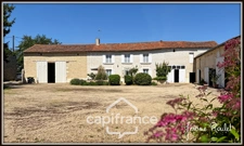 Stone house for sale in Champigny-En-Rochereau (86), 6 rooms, 4 bedrooms, 1900 m² plot with outbuildings