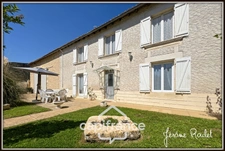Stone house for sale in Champigny-En-Rochereau (86), 6 rooms, 4 bedrooms, 1900 m² plot with outbuildings