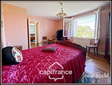 Stone house for sale in Champigny-En-Rochereau (86), 6 rooms, 4 bedrooms, 1900 m² plot with outbuildings