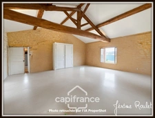 Maison en pierre à vendre 6 pièces 4 chambres + studio indépendant sur terrain 3 260 m² avec dépendances Champigny-En-Rochereau (86)