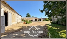 Stone house for sale in Champigny-En-Rochereau (86), 6 rooms, 4 bedrooms, 1900 m² plot with outbuildings