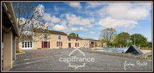 Maison en pierre à vendre 6 pièces 4 chambres + studio indépendant sur terrain 3 260 m² avec dépendances Champigny-En-Rochereau (86)