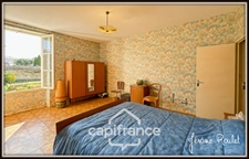 Stone house for sale in Champigny-En-Rochereau (86), single storey, to renovate, 3 rooms, 2 bedrooms, 870 m² plot with outbuildings