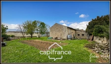 Stone house for sale, 6 rooms, 4 bedrooms + independent studio on 3,260 m² of land with outbuildings, Champigny-En-Rochereau (86)