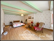 Stone house for sale to renovate, 5 rooms, 3 bedrooms, outbuildings, 1.5 ha of land, Champigny-En-Rochereau (86)
