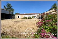 Stone house for sale in Champigny-En-Rochereau (86), 6 rooms, 4 bedrooms, 1900 m² plot with outbuildings