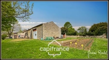 Maison en pierre à vendre 6 pièces 4 chambres + studio indépendant sur terrain 3 260 m² avec dépendances Champigny-En-Rochereau (86)