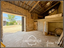 Stone house for sale in Champigny-En-Rochereau (86), 6 rooms, 4 bedrooms, 1900 m² plot with outbuildings
