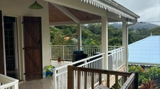 Vente spacieuse maison F5 dans zone pavillonnaire rurale au Lamentin (97232).