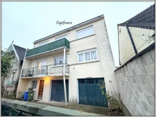 DRANCY - IMMEUBLE 2 APPARTEMENTS F3 + GARAGES + JARDIN