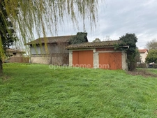 Terrain 937 m², Hangar et garages