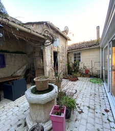 Ruelle sur Touvre. Maison 143 m² avec dépendance en pierre et garage 