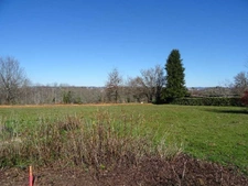 A PANAZOL TRES BEAU TERRAIN PLAT DE 2370 M² AVEC CU TRES BELLE VUE DEGAGEE