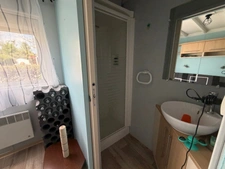SAINT CYR EN TALMONDAIS (85) DANS RESIDENCE AVEC PISCINE CHALET BOIS 3 CHAMBRES AVEC VERANDA ET JARDIN