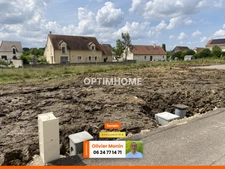 Au calme, cœur de village, terrain constructible et viabilisé de 848 m2 