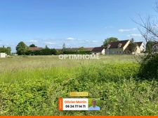 Au calme, cœur de village, terrain constructible et viabilisé de 891 m2 