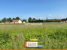Au calme, cœur de village, terrain constructible et viabilisé de 891 m2 