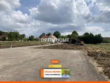Au calme, cœur de village, terrain constructible et viabilisé de 848 m2 