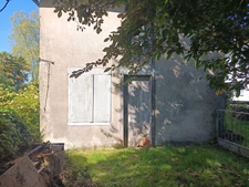 Exclusivité : Terrain constructible arboré en Cœur de Ville avec petite dépendance