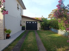 MAISON COMPOSEE DE DEUX APPARTEMENTS ,QUARTIER CALME.