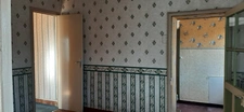 MAISON MITOYENNE PLAIN PIED AVEC POTENTIEL D'AMÉNAGEMENT.
