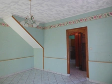  MAISON FAMILIALE A FORT POTENTIEL  AVEC SES 4 CHAMBRES, SON TERRAIN ET SON GRAND GARAGE