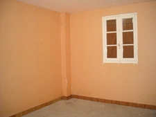 APPARTEMENT DE 80 M² AVEC COUR ET TERRAIN