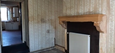 MAISON MITOYENNE PLAIN PIED AVEC POTENTIEL D'AMÉNAGEMENT.