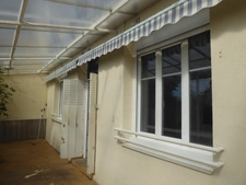  IDÉALE 1ER ACHAT POUR CETTE MAISON DE VILLE AVEC GARAGES, ATELIER ET SON TERRAIN