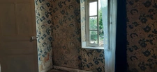 MAISON MITOYENNE PLAIN PIED AVEC POTENTIEL D'AMÉNAGEMENT.