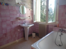  MAISON FAMILIALE A FORT POTENTIEL  AVEC SES 4 CHAMBRES, SON TERRAIN ET SON GRAND GARAGE