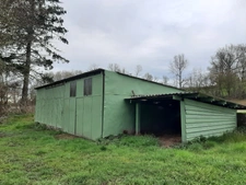 RARE OPPORTUNITÉ . GRAND BATIMENT AVEC LOGEMENT,  HANGAR ET PARKING SUR 6032 M²