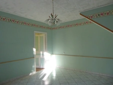  MAISON FAMILIALE A FORT POTENTIEL  AVEC SES 4 CHAMBRES, SON TERRAIN ET SON GRAND GARAGE