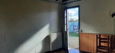 MAISON MITOYENNE PLAIN PIED AVEC POTENTIEL D'AMÉNAGEMENT.