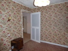 BELLE OPPORTUNITÉ POUR CETTE MAISON MITOYENNE A MODERNISER ET SON JOLI TERRAIN CLOS ET ARBORÉ