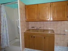  MAISON FAMILIALE A FORT POTENTIEL  AVEC SES 4 CHAMBRES, SON TERRAIN ET SON GRAND GARAGE