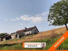 FERMETTE A RÉNOVER AVEC SES DÉPENDANCES, SUR 2,7 HA DE TERRAIN DANS CADRE BUCOLIQUE. 