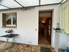 MAISON DE 1967, 4 CHAMBRES, GARAGE ET VERANDA SUR 400M² EN SECTEUR RÉSIDENTIEL