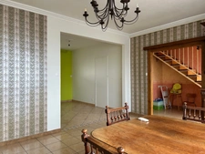 MAISON DE 1967, 4 CHAMBRES, GARAGE ET VERANDA SUR 400M² EN SECTEUR RÉSIDENTIEL