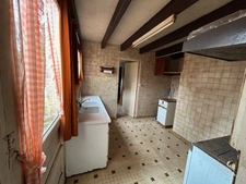 ENSEMBLE DE DEUX MAISONS DE VILLAGE A RESTAURER, COURETTE, GARAGE et JARDIN 785 m²