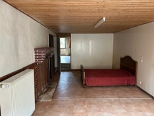 ENSEMBLE DE DEUX MAISONS DE VILLAGE A RESTAURER, COURETTE, GARAGE et JARDIN 785 m²