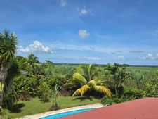 Superb villa with GRAND CUL SAC MARIN VIEW and swimming pool on 1001 m² of flat land