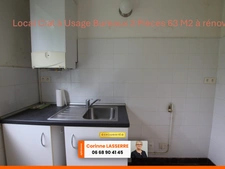 GIEN partie d'immeuble de 3 lots principaux avec garages et caves
