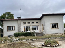 MAISON 4 CHAMBRES à rénover située dans un environnement calme proche du centre ville