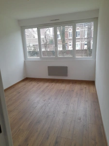 Rue de la Ferme - Grand 2 pièces de 57 m² - RDC SURELEVE + PARKING PRIVE dans RESIDENCE