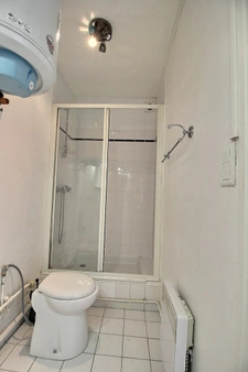Rue SAINT PLACIDE - STUDIO 21 M² - 6ème et dernier étage AVEC ascenseur