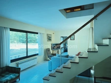  Maison d’architecte avec studio indépendant et vaste terrain boisé de 4 hectares